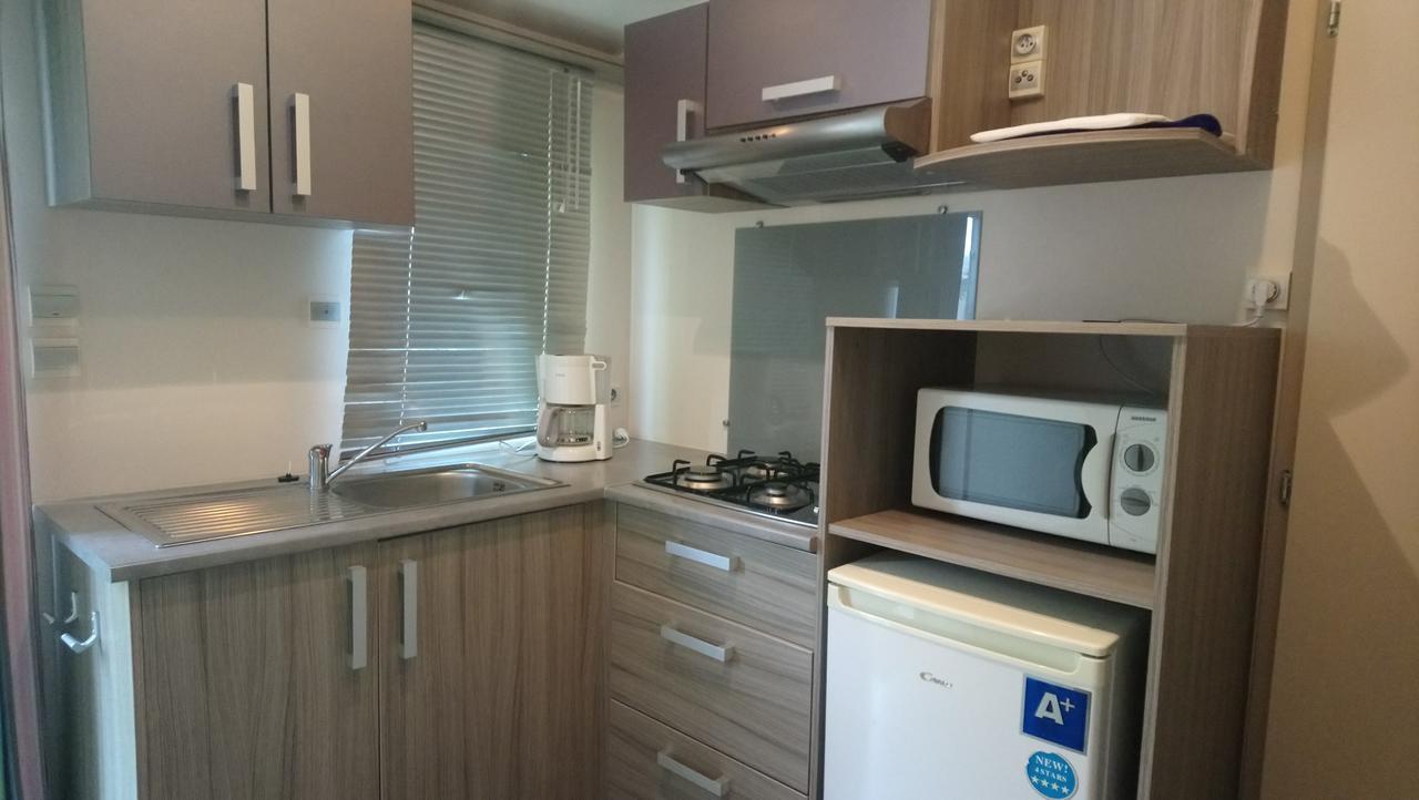 Отель Camping L'Arada Parc Sonzay Экстерьер фото